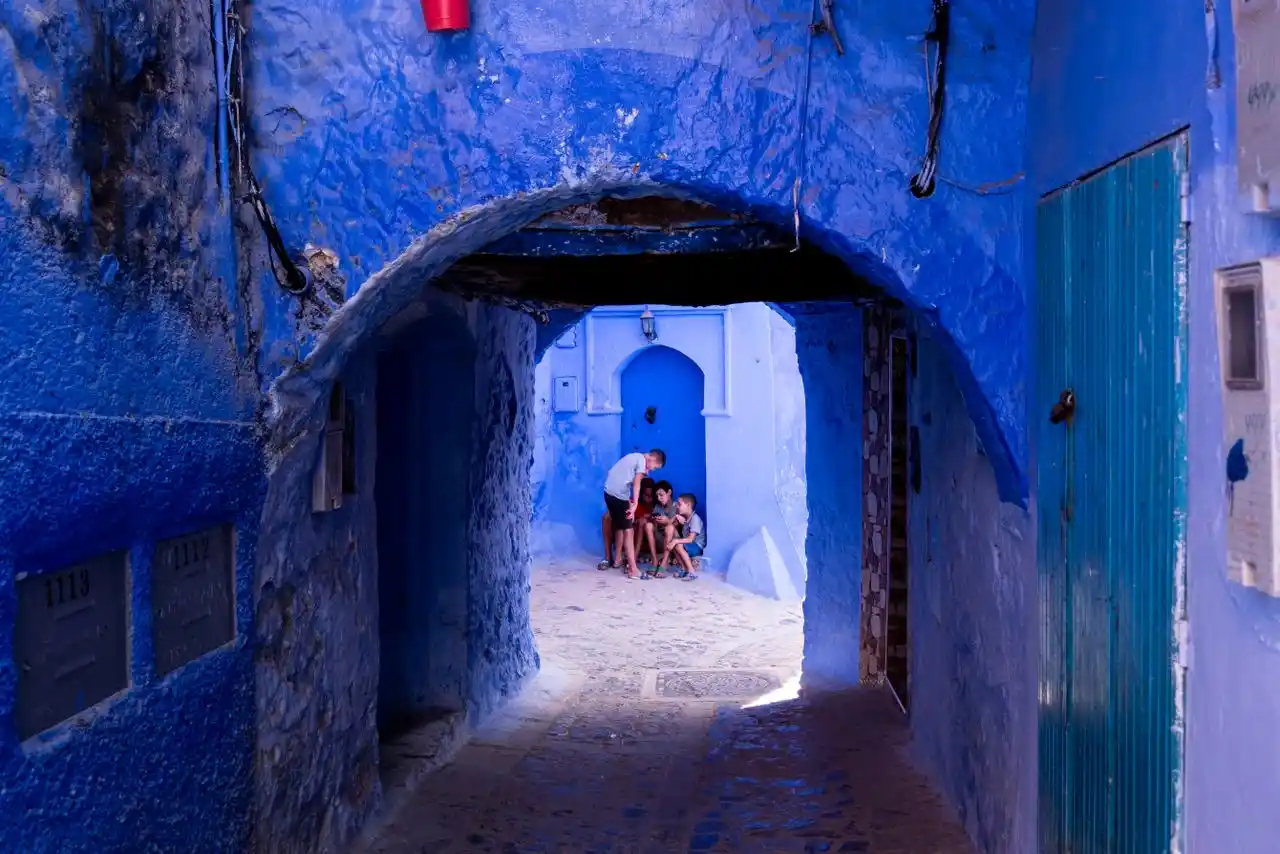 Blue-painted alley in Chefchaouen, the first overnight stop on the six-day Morocco itinerary