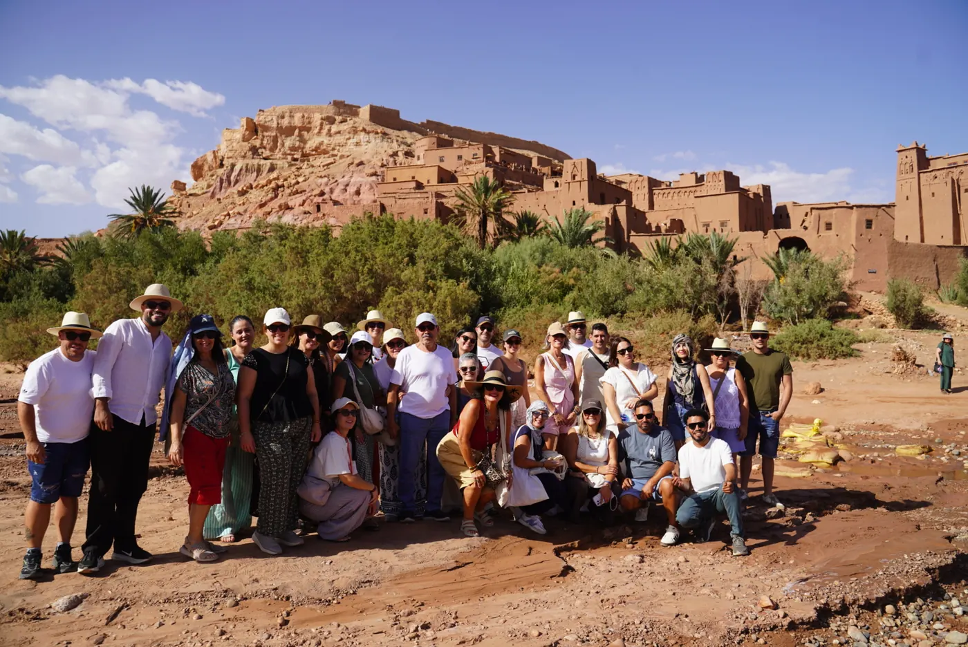 Complete Morocco travelers visiting the fortified ksar of Ait Ben Haddou
