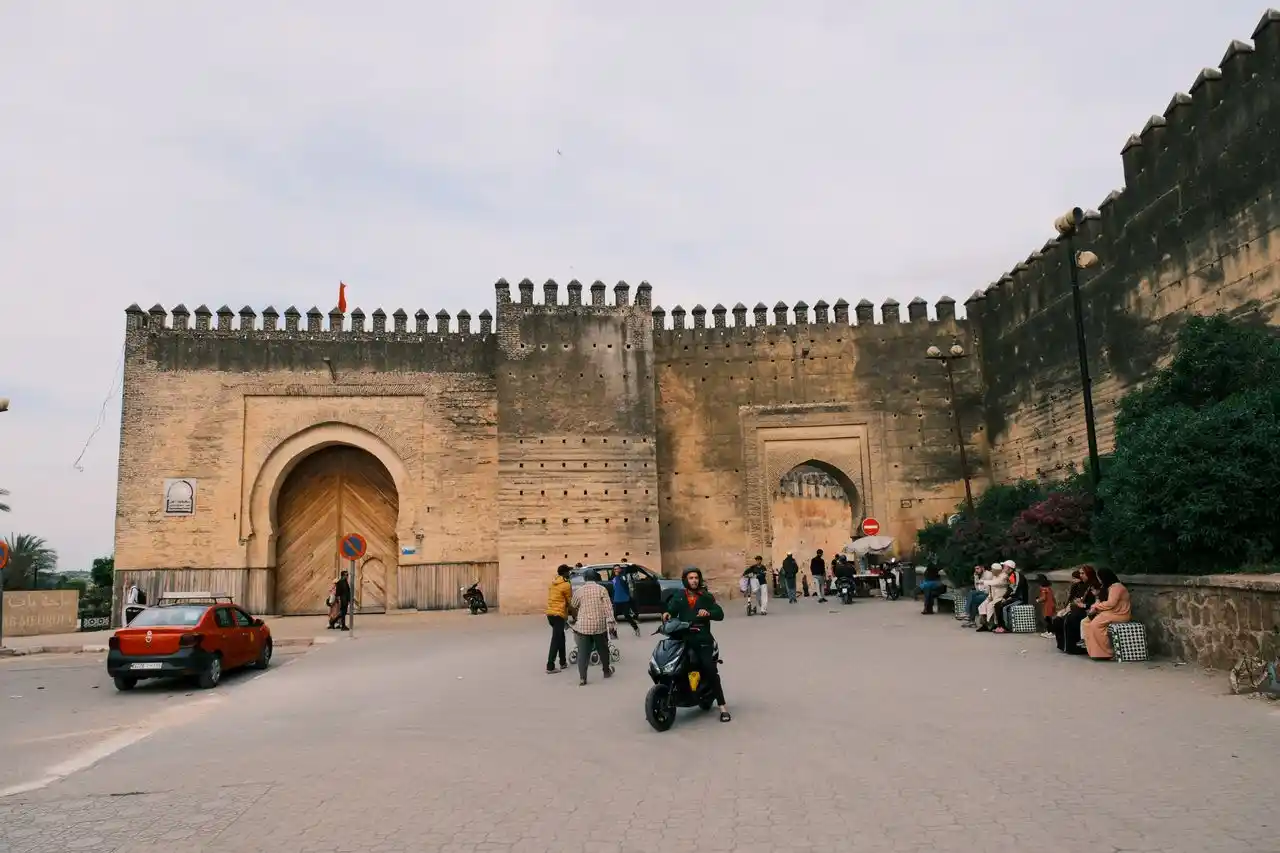 Historic medina gate and fortified walls in Fes Morocco