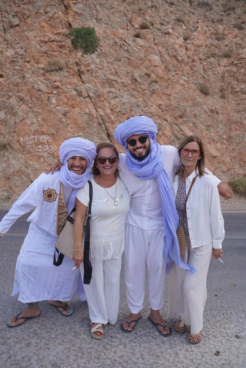Travelers and guides visiting a gorge on a private Morocco tour