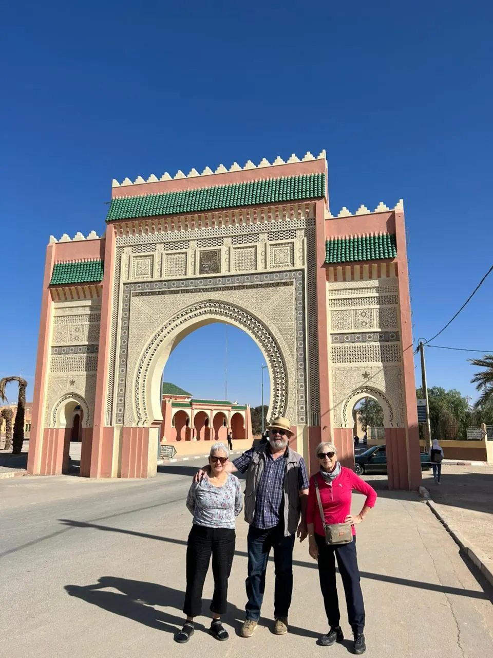 Travelers at the city gate in Rissani